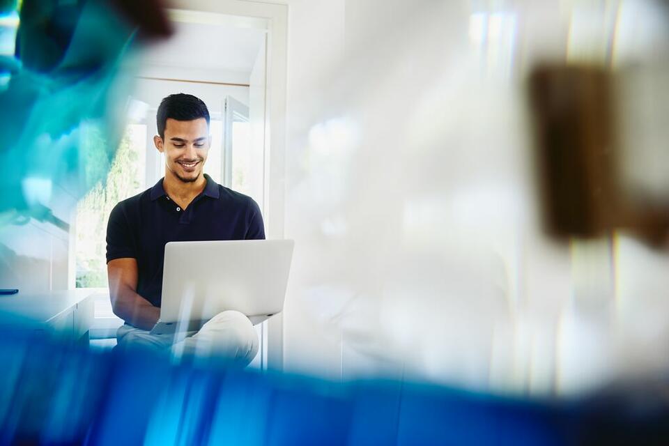 man working on laptop